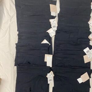 - - Bundle of case of 12 Girls black tights size 4t